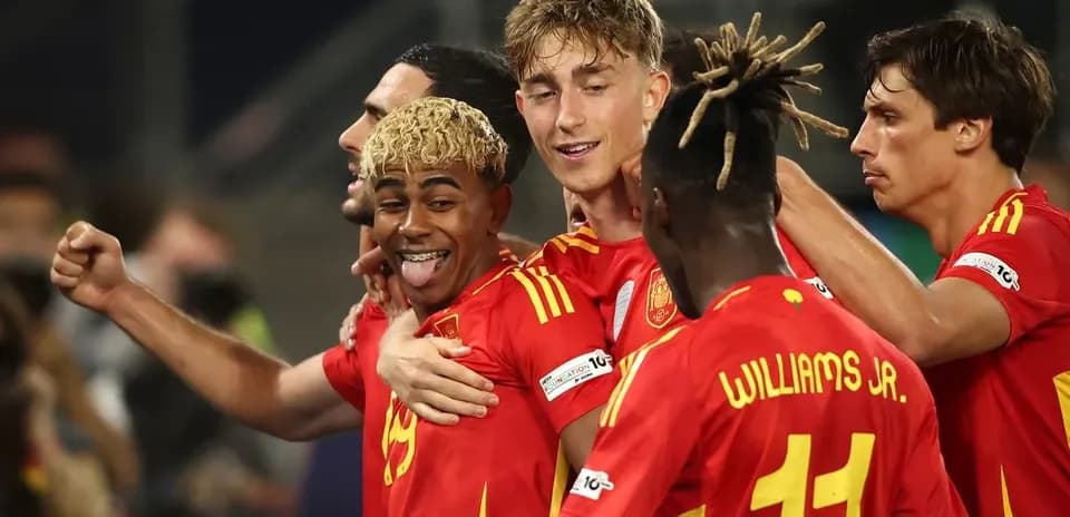 Spanish players celebrating a goal together