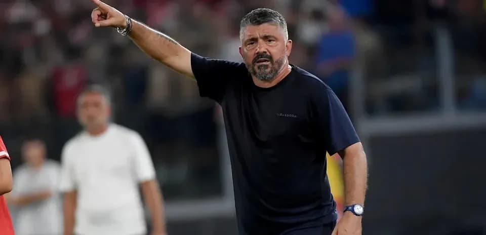 Coach gesturing during a match from the sidelines