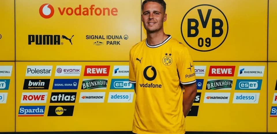 Player in Borussia Dortmund kit at press event