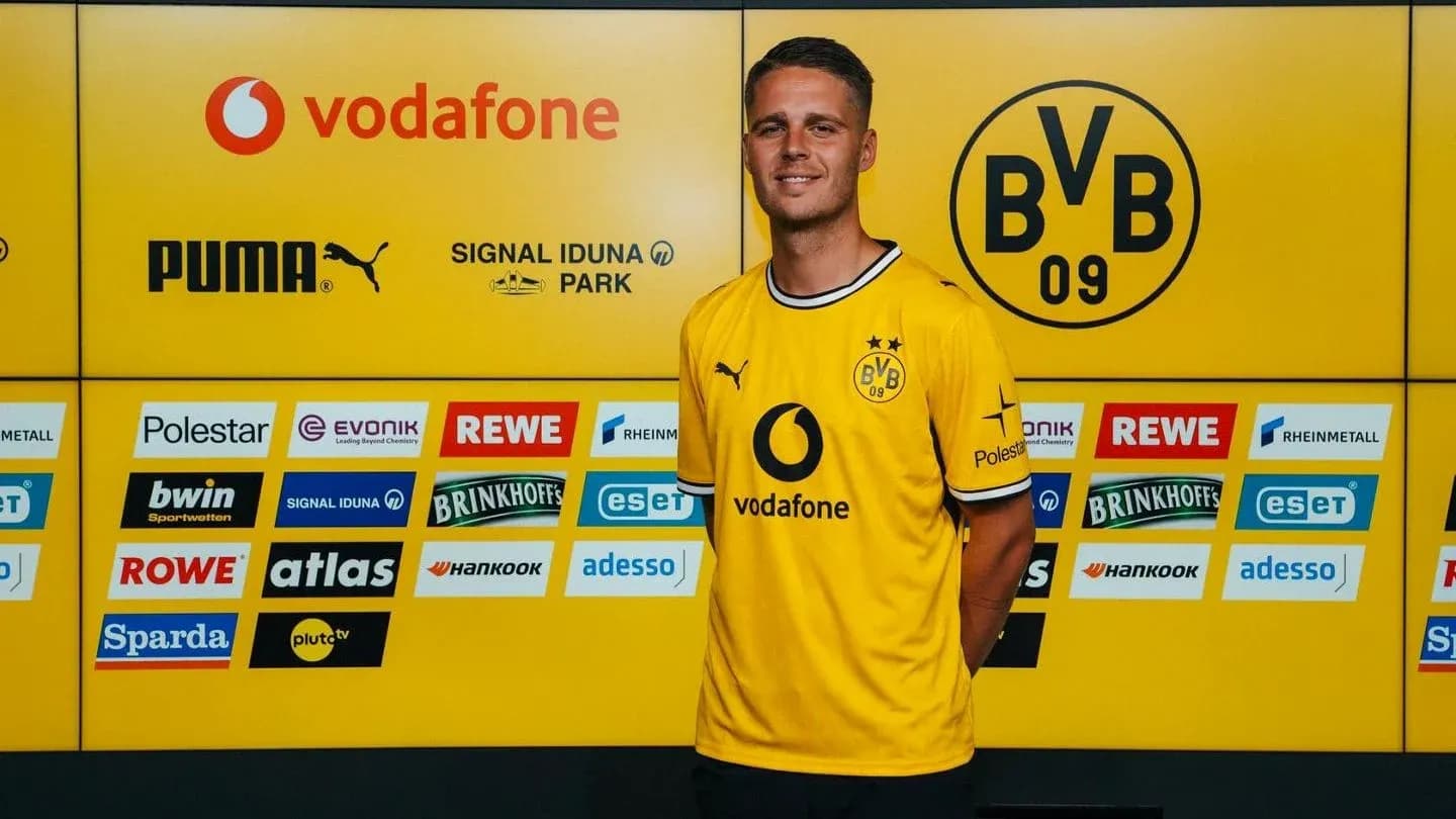 Player in Borussia Dortmund kit at press event