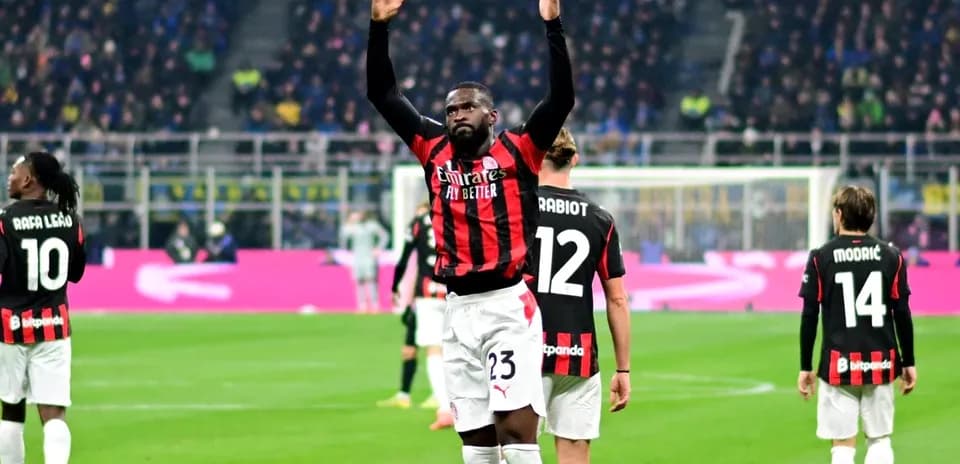 Player celebrating during match with teammates in background