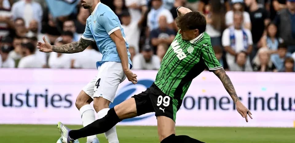 Two players competing for the ball during match