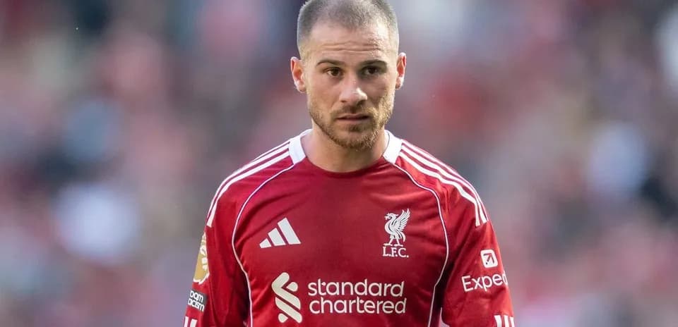 Player in red Liverpool jersey on the field
