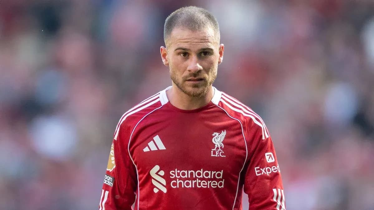 Player in red Liverpool jersey on the field