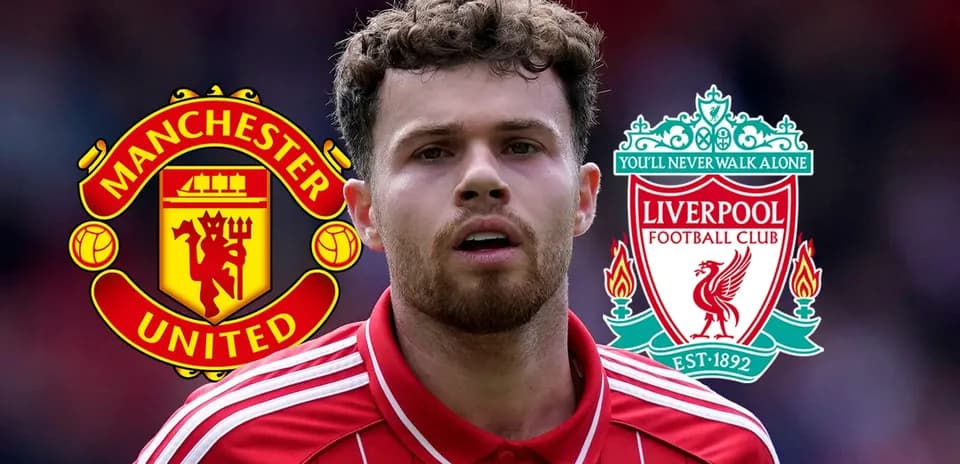Player in red shirt with Manchester United and Liverpool logos