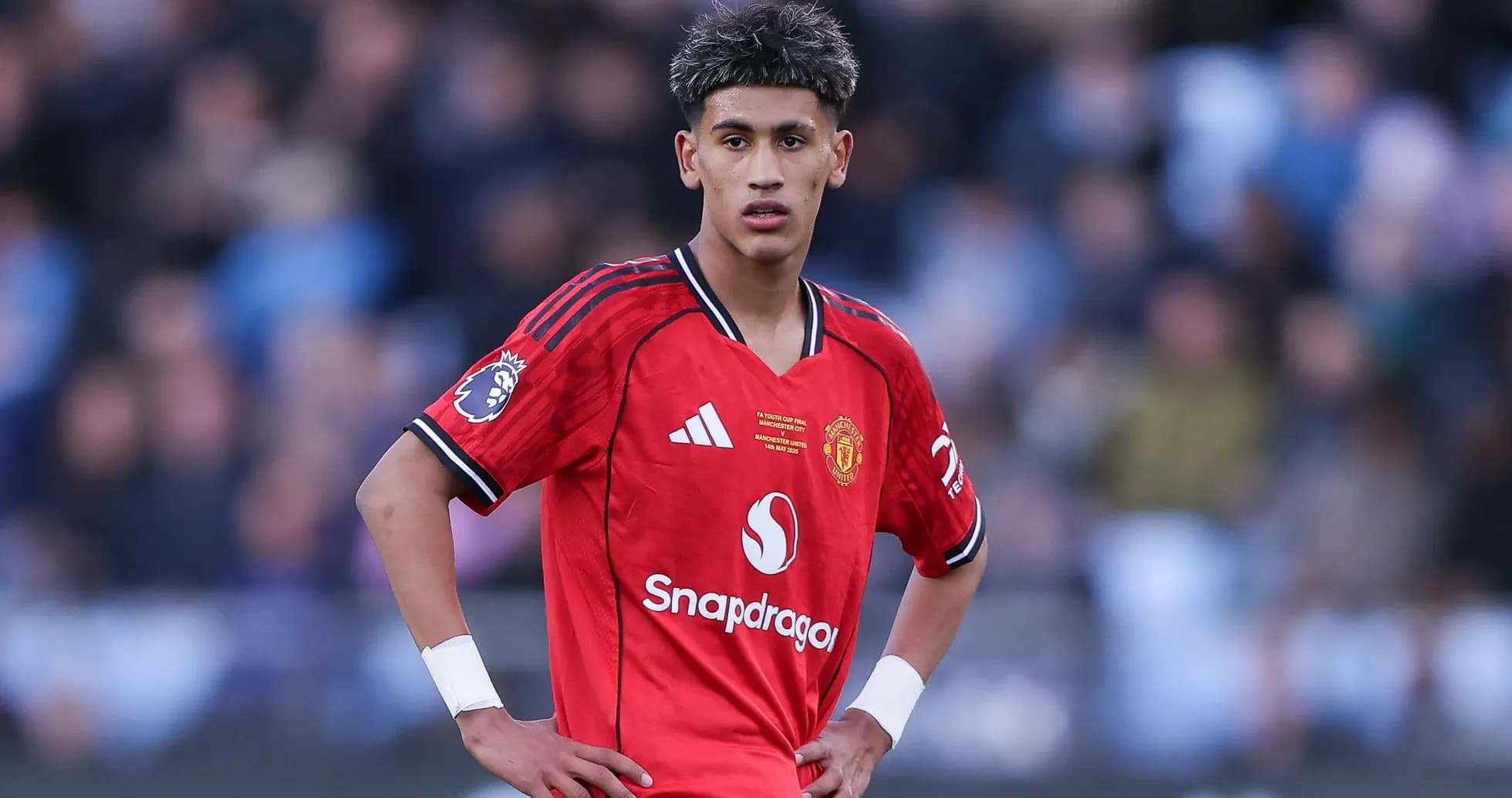Player in red Manchester United kit on field