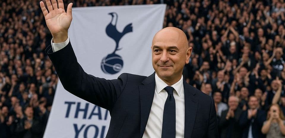 Man waving in front of Tottenham supporters' banner