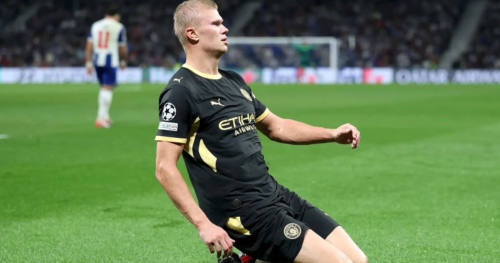 Player on the ground during UEFA Champions League match