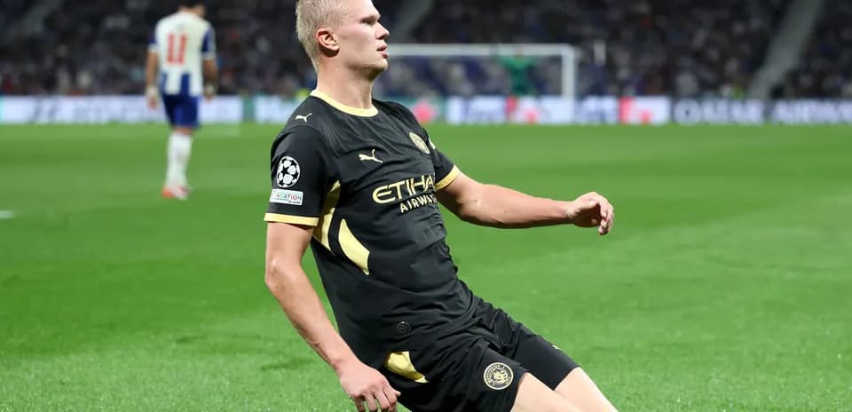 Player on the ground during UEFA Champions League match