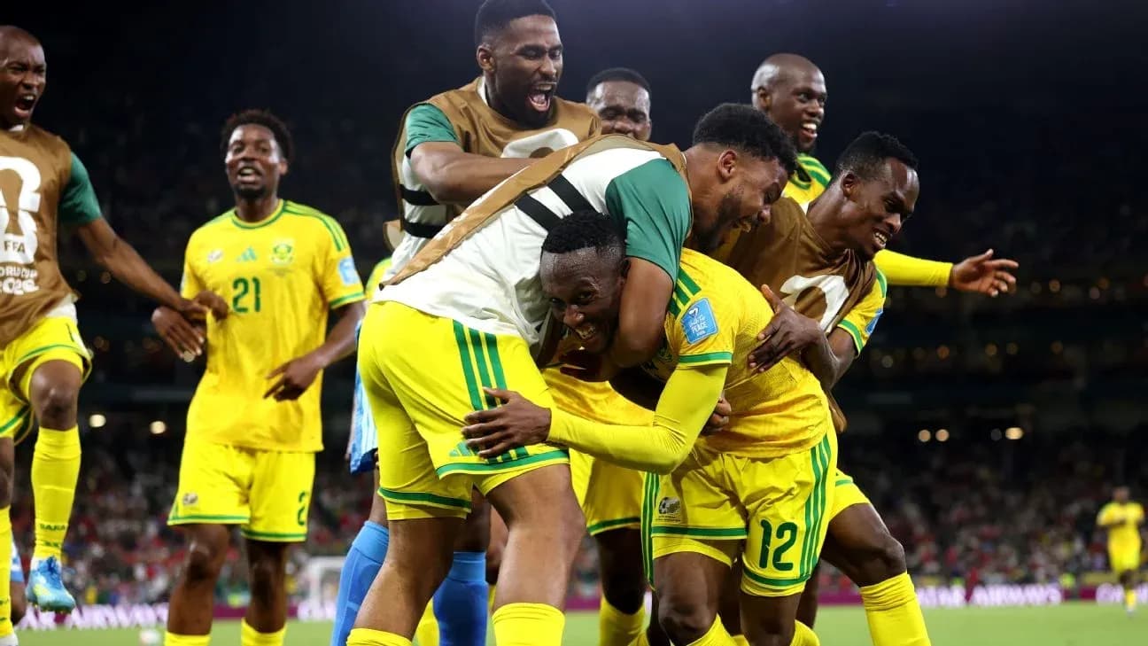 Players celebrating after scoring a goal