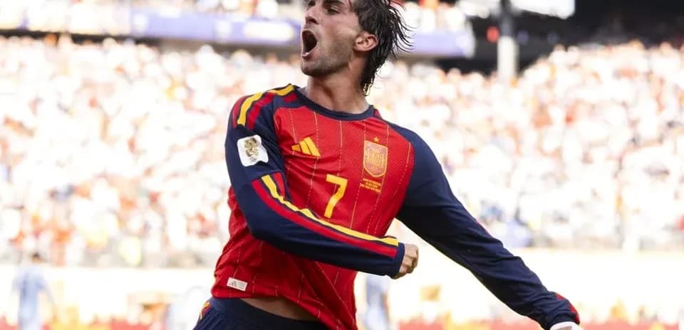 Player celebrating a goal in Spain jersey