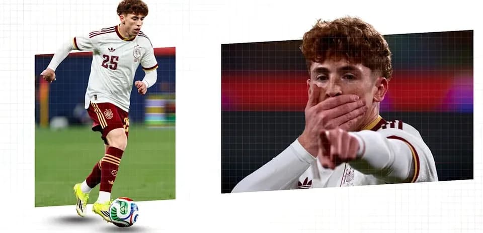 Player in Spain kit dribbling with ball