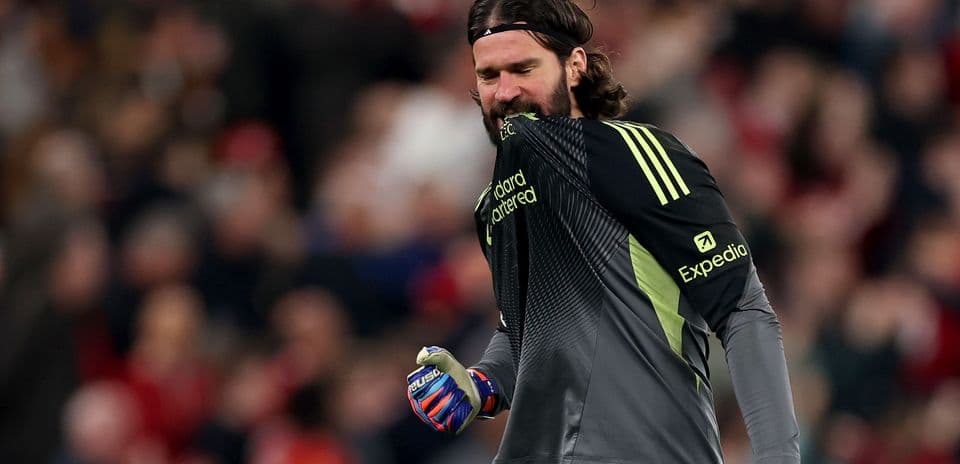 Goalkeeper celebrating in front of crowd