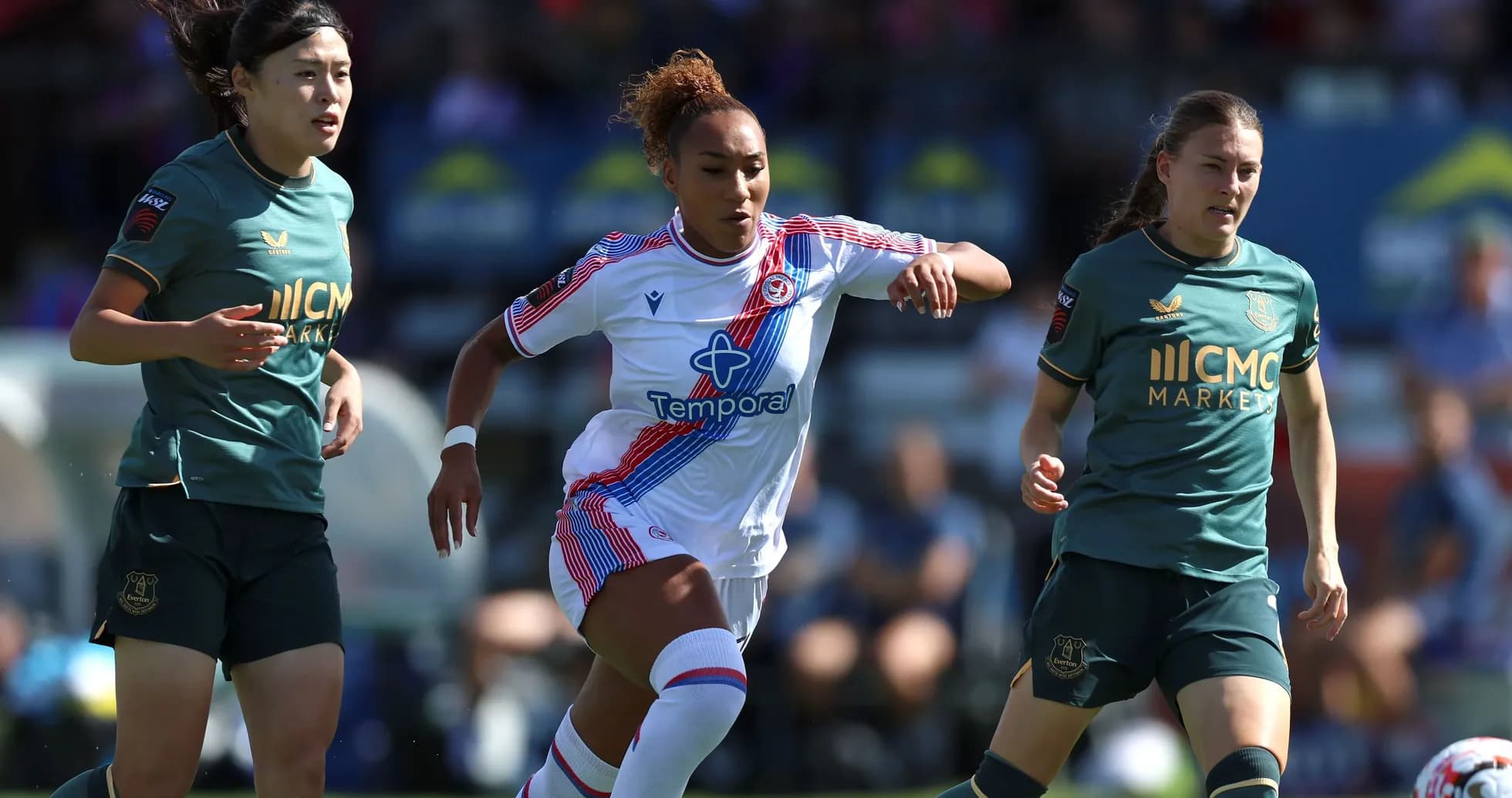 Players competing for the ball during soccer match