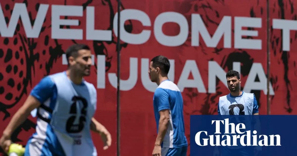 Players training in front of 'Welcome to Tijuana' sign