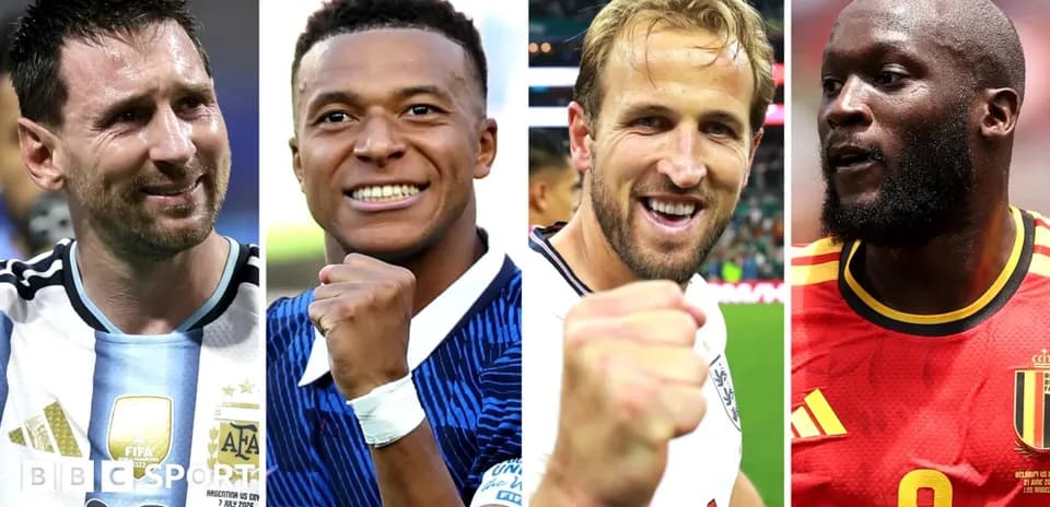 Four football players celebrating with clenched fists