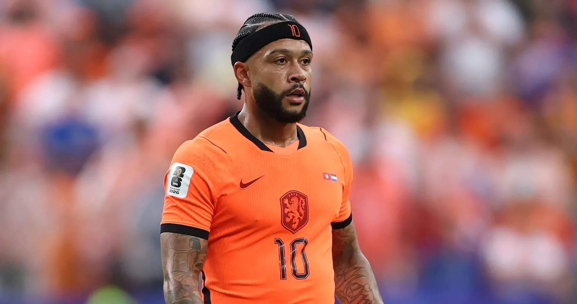 Player in orange jersey during a match