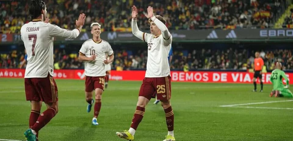 Spanish players celebrating a goal during match