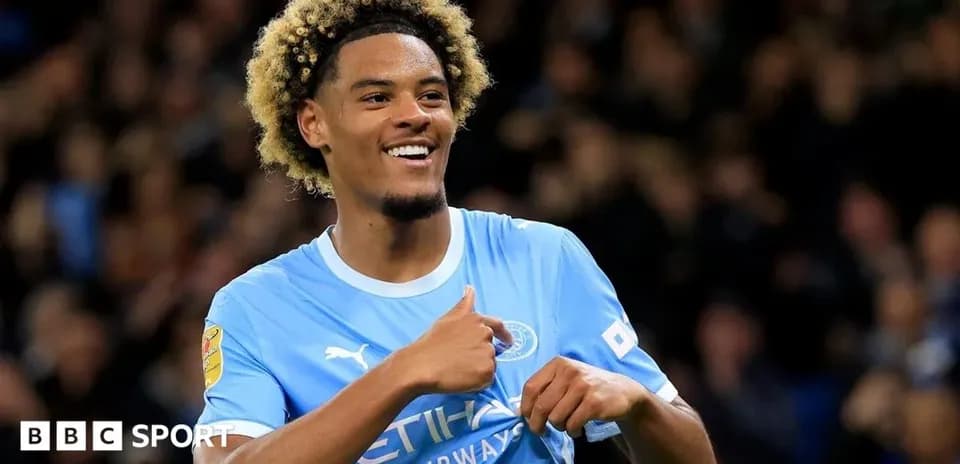 Player celebrating after scoring a goal for Manchester City