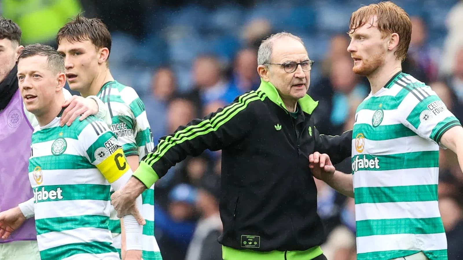 Celtic players and coach during match confrontation