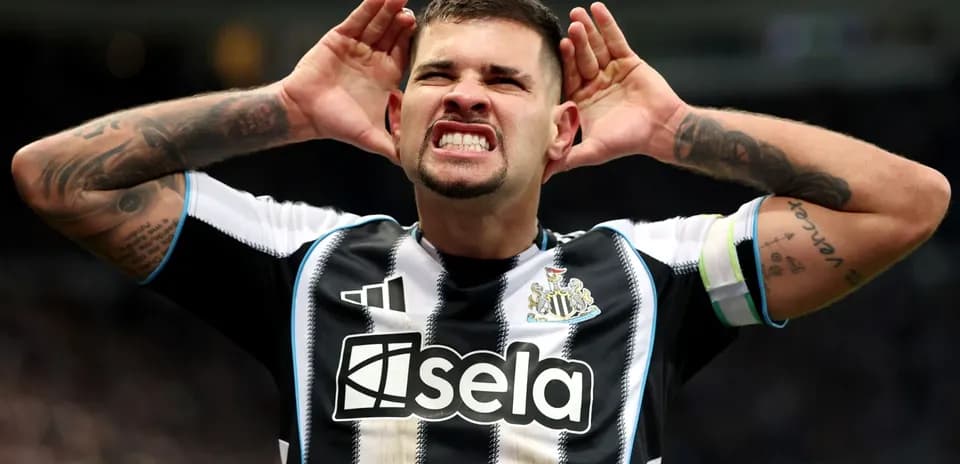 Player celebrating with hands on head during match