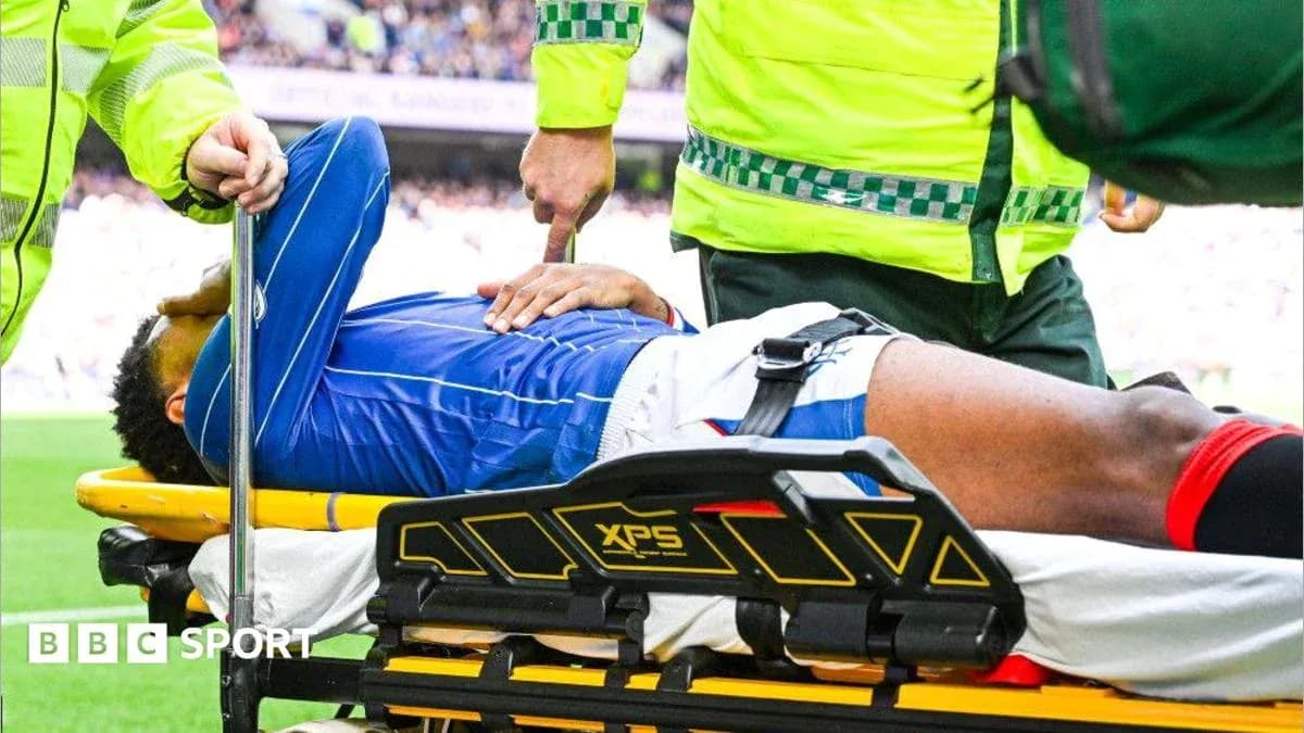 Player being stretchered off by medical staff