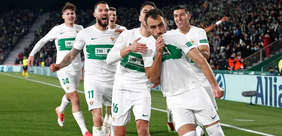 Elche players celebrating a goal in La Liga match