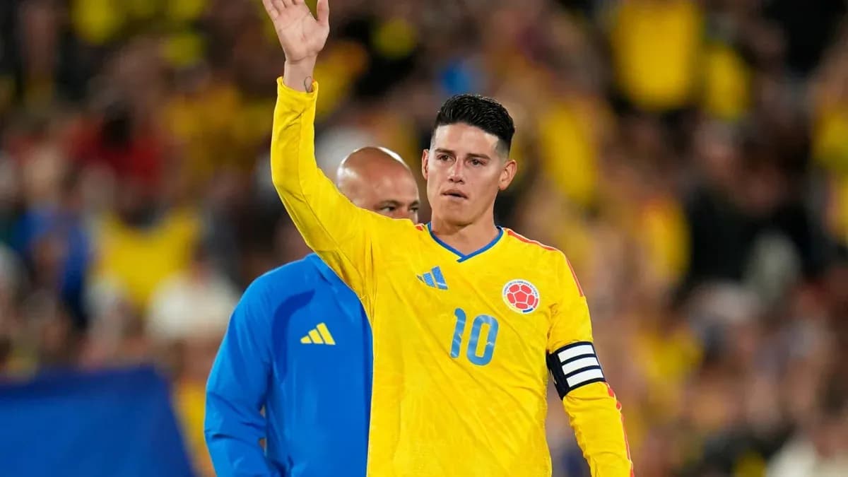 Player waving while wearing Colombia national team jersey