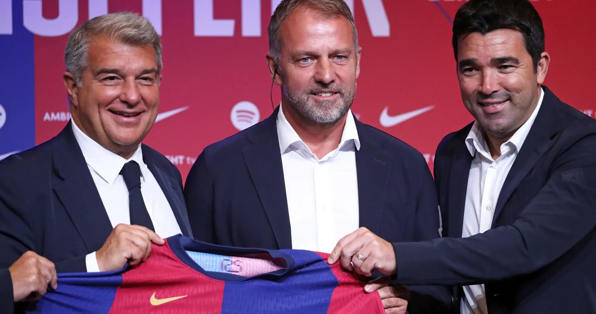 Officials presenting FC Barcelona jersey at event