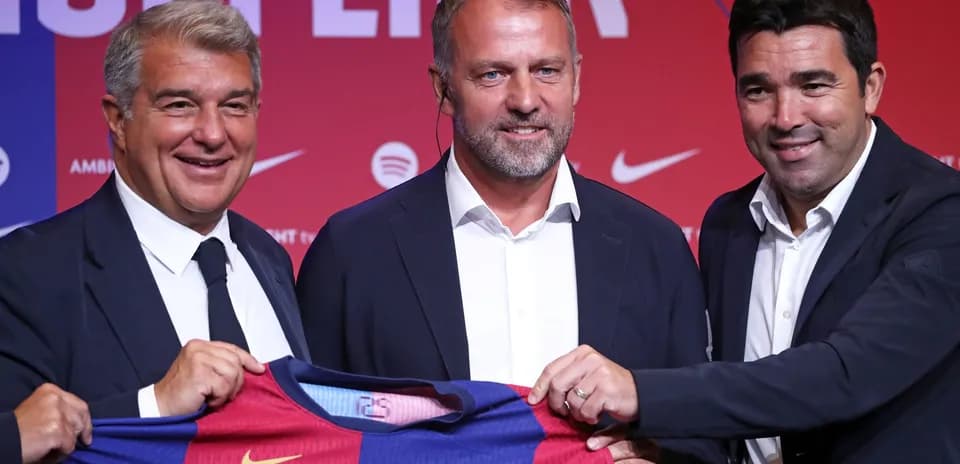 Officials presenting FC Barcelona jersey at event