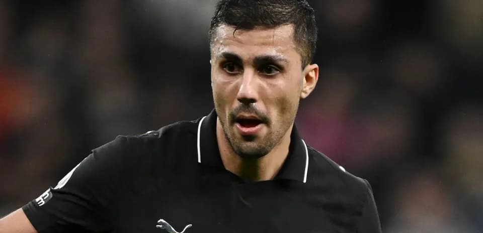 Player wearing black jersey during match action