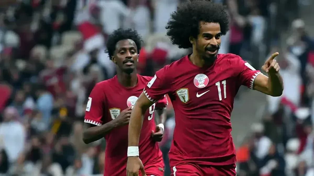 Qatar players celebrating a goal during match