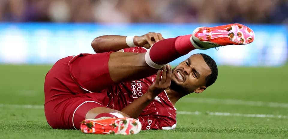 Player on the ground holding injured leg
