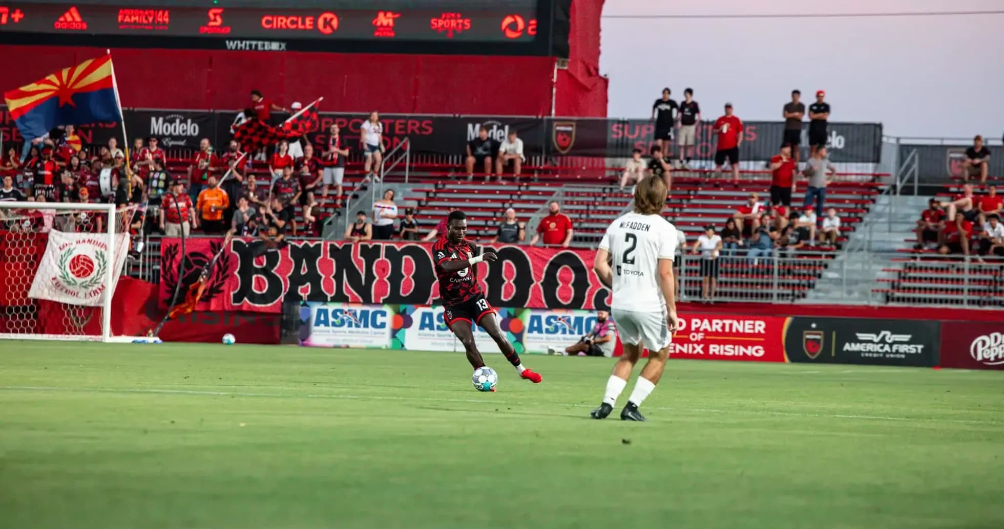 Player passing the ball during Phoenix Rising match