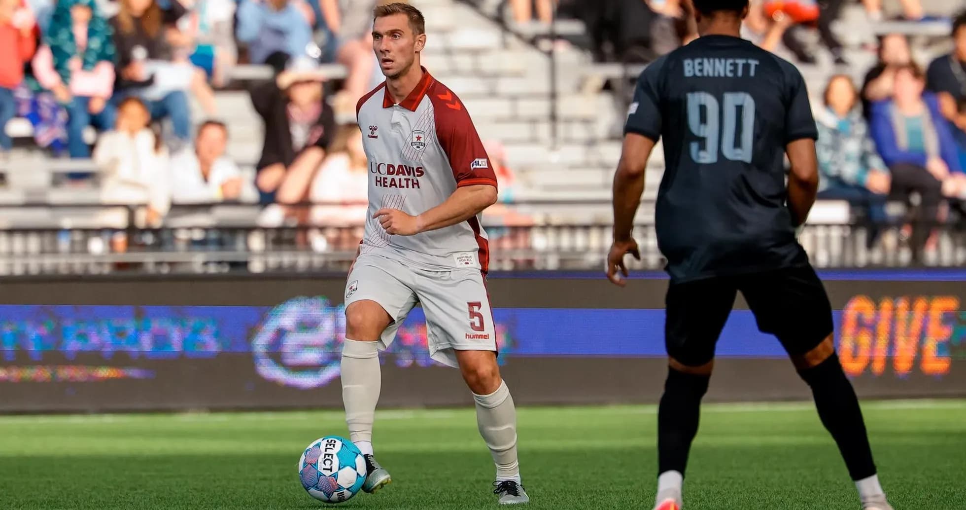 Player dribbling ball during Colorado Springs match