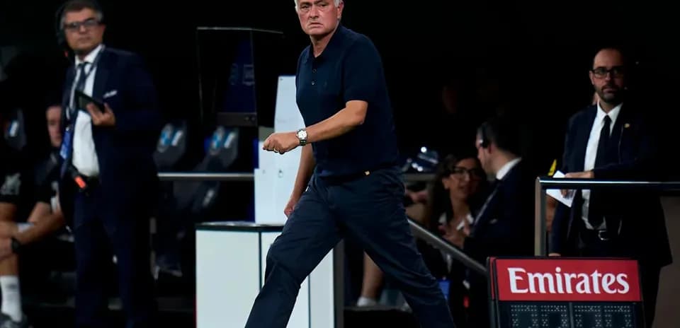 Manager walking on the sidelines during match