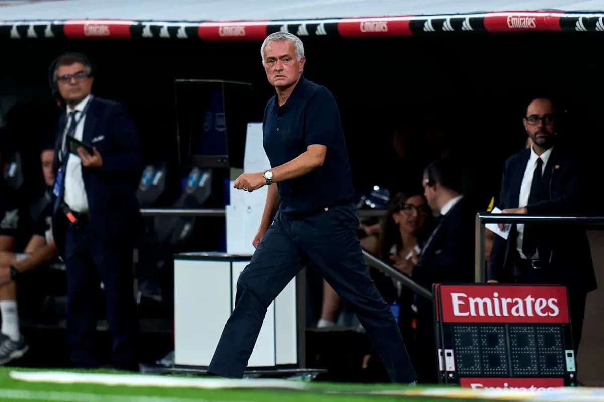 Manager walking on the sidelines during match