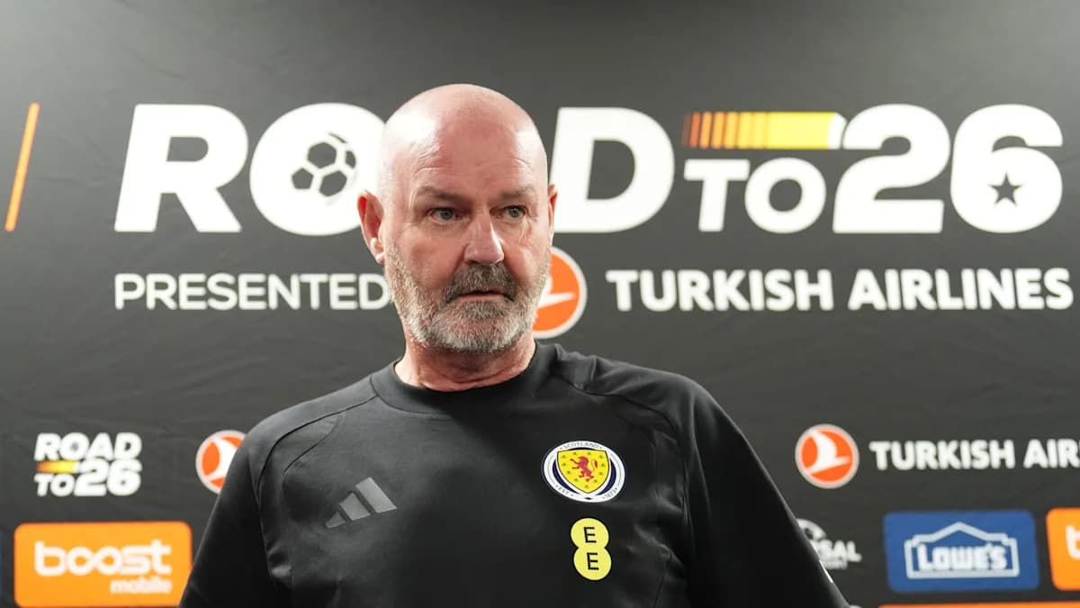 Scotland coach at press conference backdrop