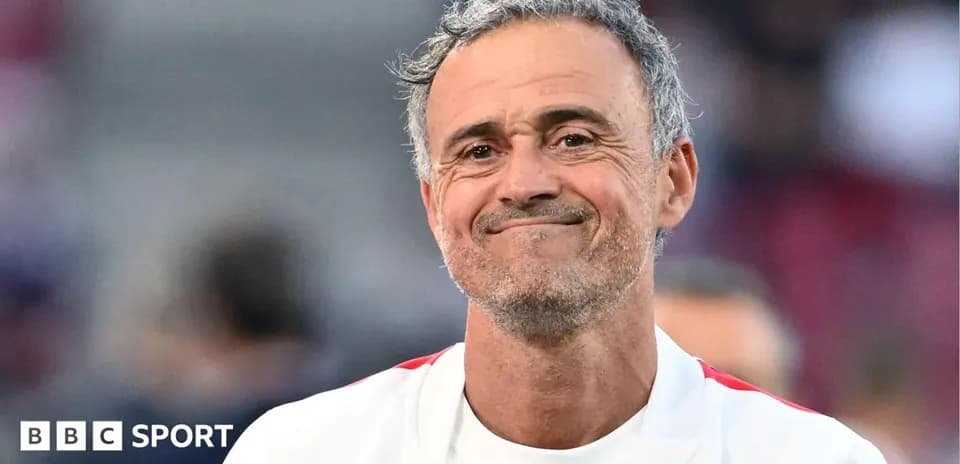 Coach smiling during match warm-up session