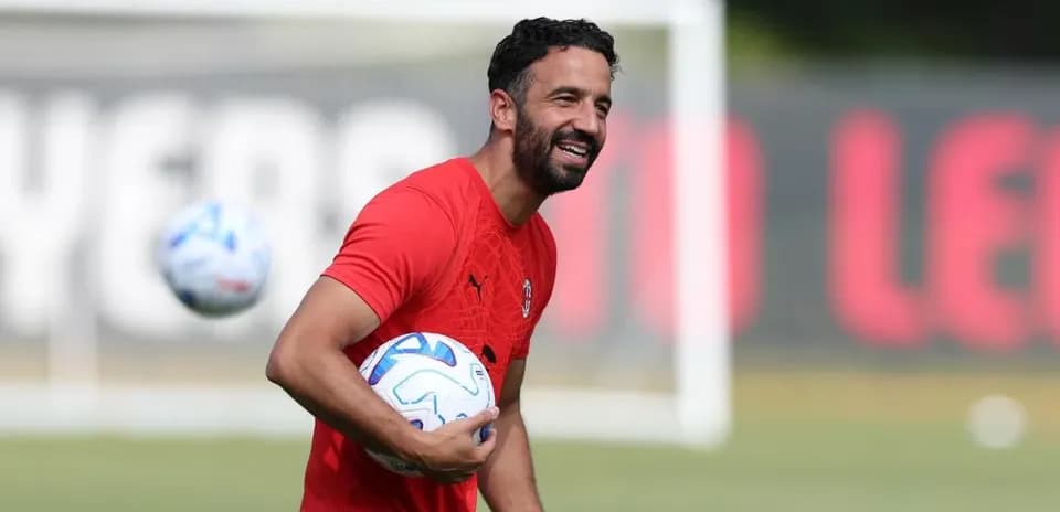 Player juggling soccer balls during training session