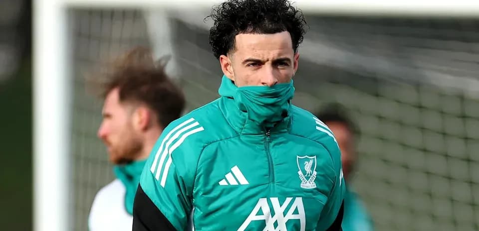 Player in Liverpool training kit during practice session