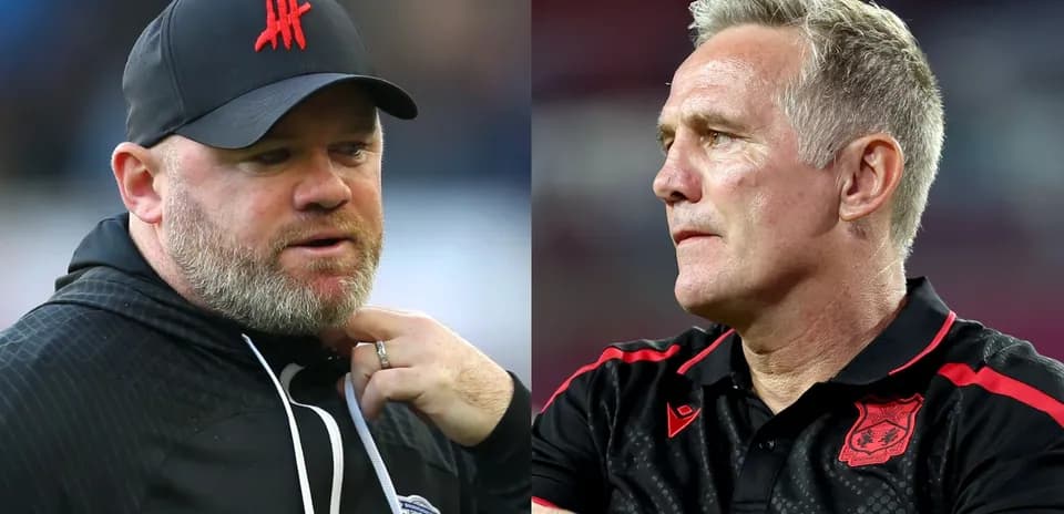 Two football managers in separate team kits