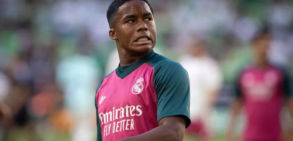 Player in Real Madrid training kit during warm-up