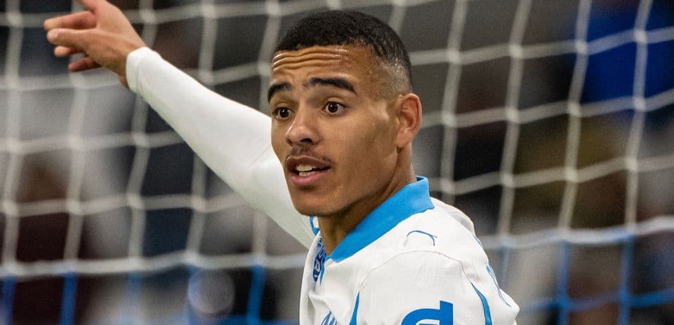 Player celebrating a goal in Marseille jersey