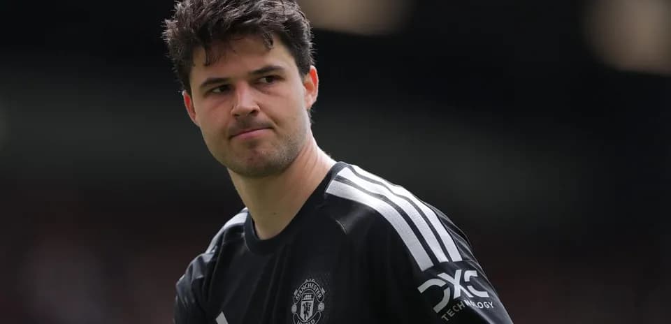 Goalkeeper in Manchester United kit during match