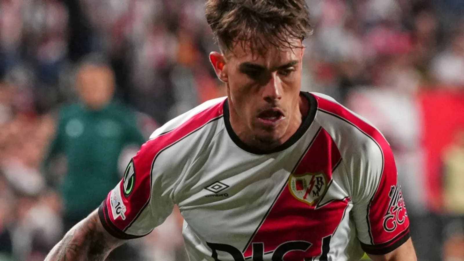 Player in Rayo Vallecano kit during match