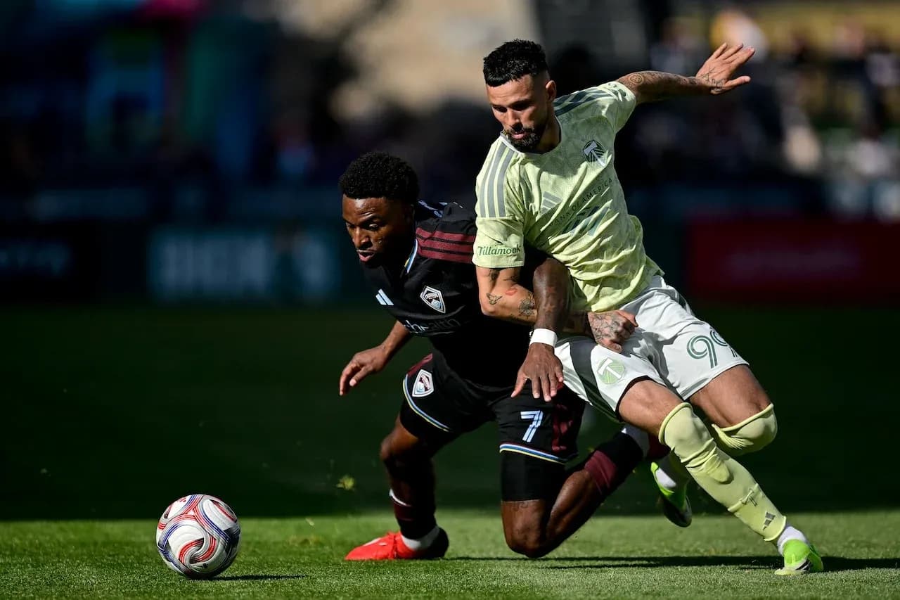 Players competing for the ball during match