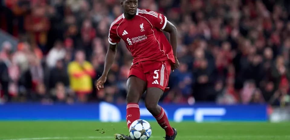 Liverpool player dribbling the ball during match