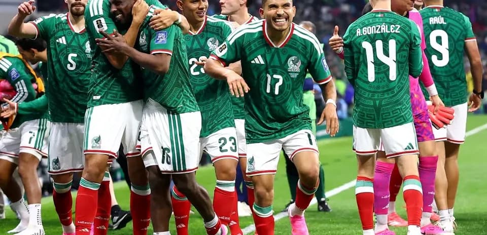 Mexico team celebrating during World Cup match