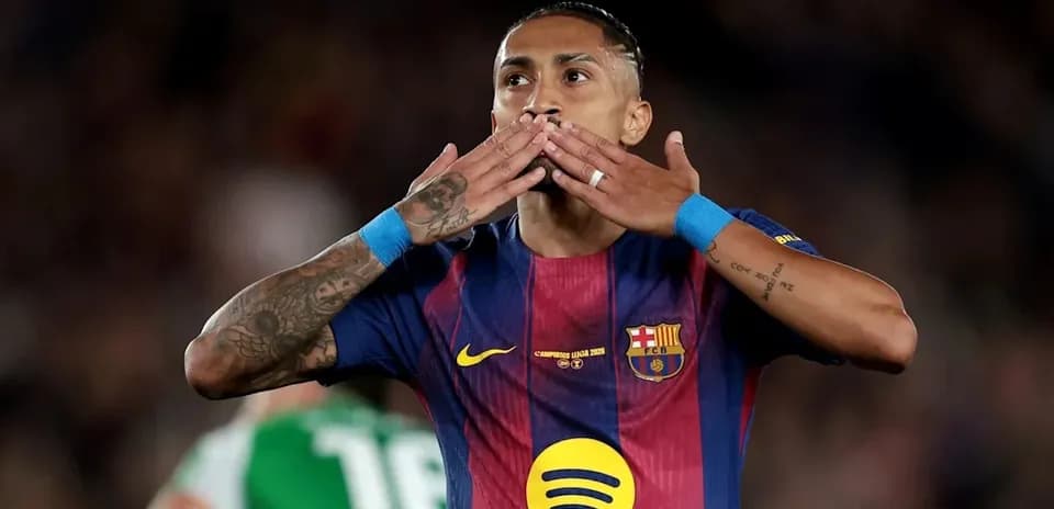 Player celebrating with kisses after scoring goal